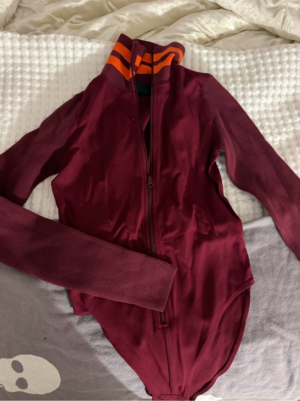 Maroon Zip-Front Bodysuit with Orange-Striped Collar